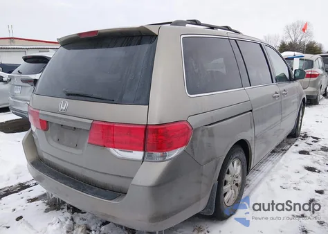 2010 Honda Odyssey Ex-L z USA, uszkodzony, nr VIN 5FNRL3H7XAB099429